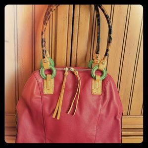 Leather statement handbag.